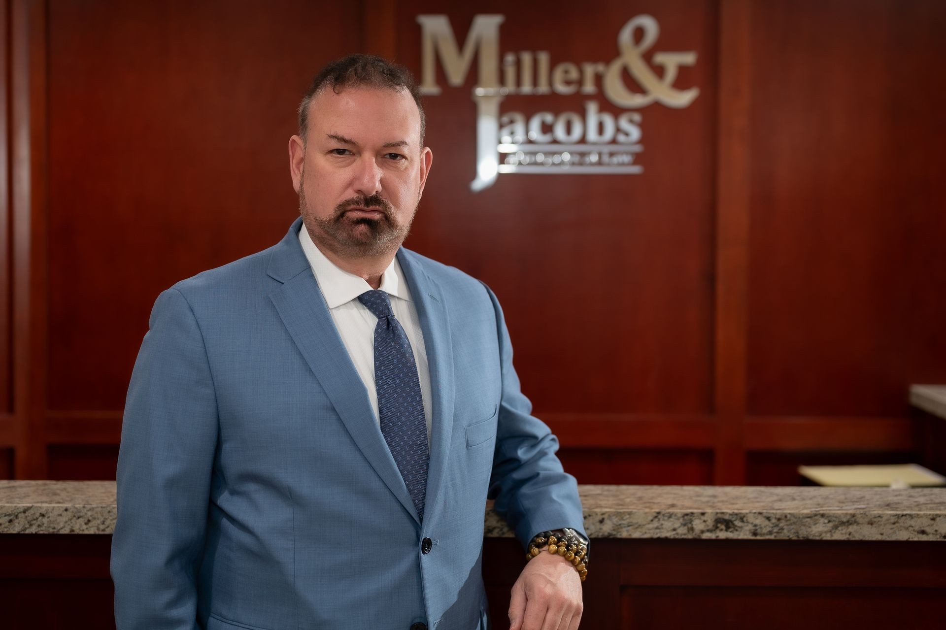 Attorney Rick S. Jacobs, Esquire in blue suit and blue tie